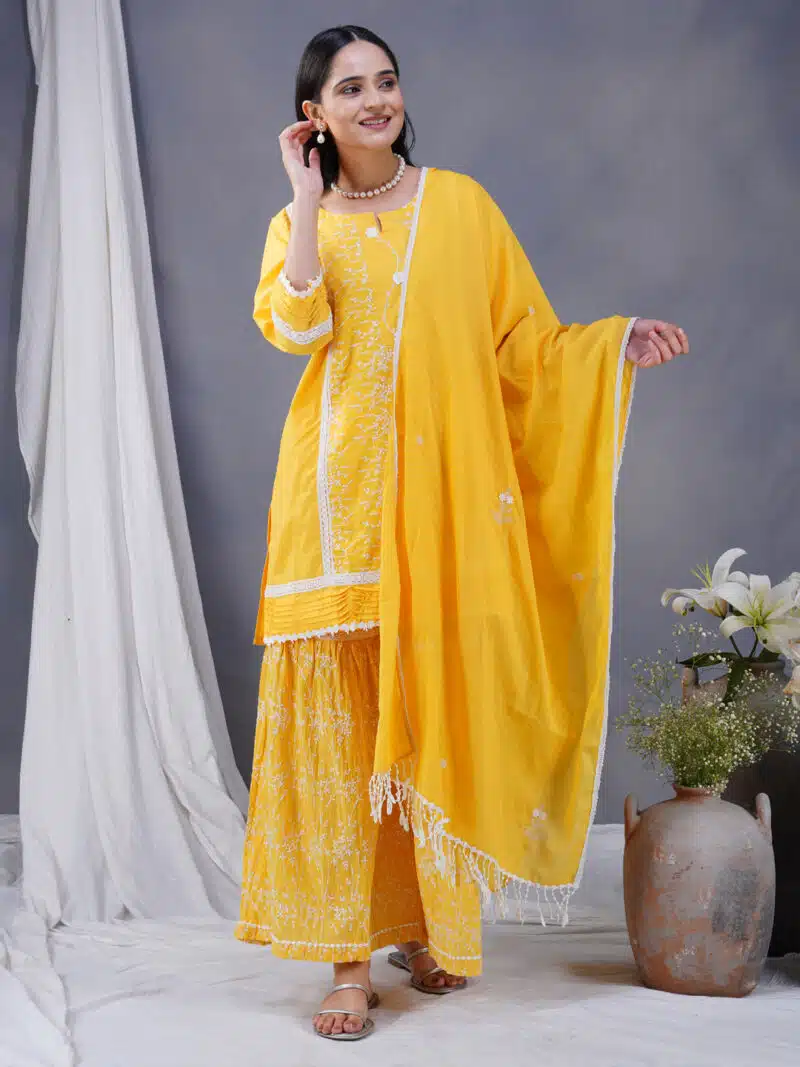Yellow Embroidered Cotton kurta Paired With Matching Pant And Dupatta